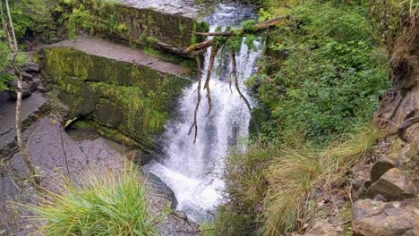 dramatic slow motion of big waterfall at sgwd clun-gwyn in brecon beacons wales uk