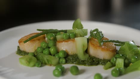 Plate-with-scallop-is-served-with-vegetables