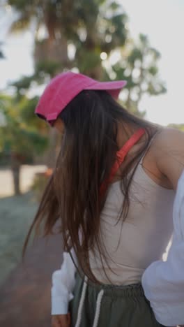 teenage girl posing in a park