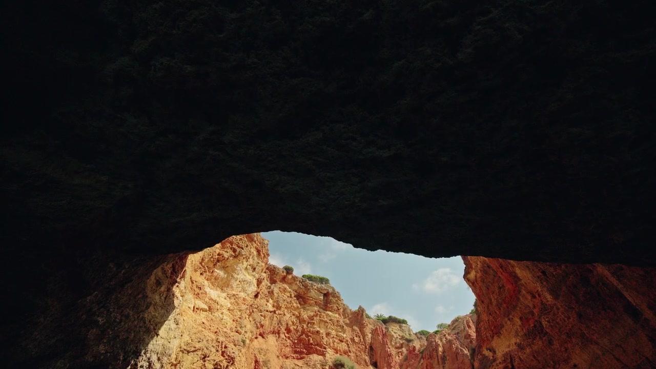 View of Blue Sky Through Opening of Sea Cave