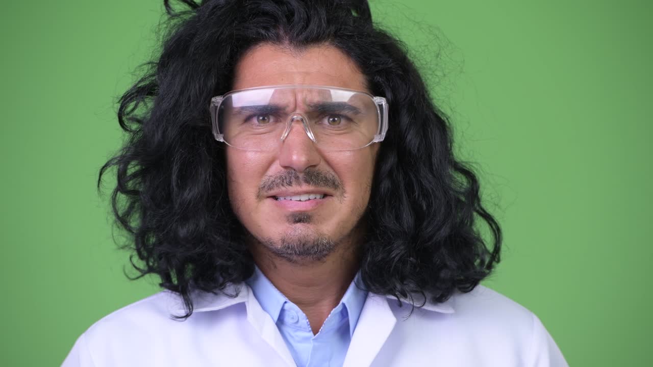 Crazy scientist wearing protective glasses