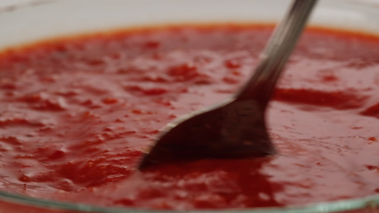 Stirring Tomato-Based Sauce