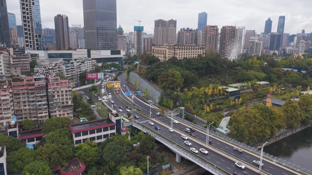 Descending drone shot showing a busy street in Guiyang, Guizhou Province, China