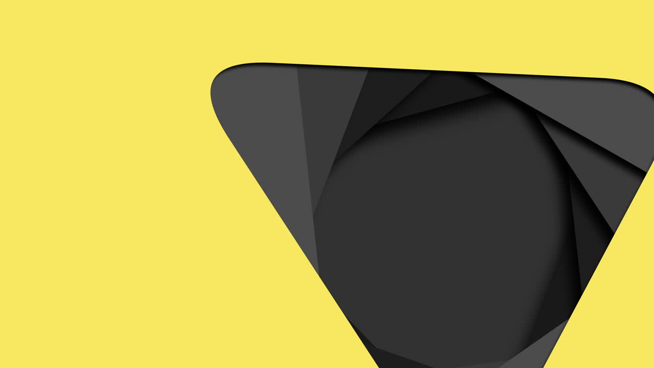 Bold black triangle on yellow background folded paper art