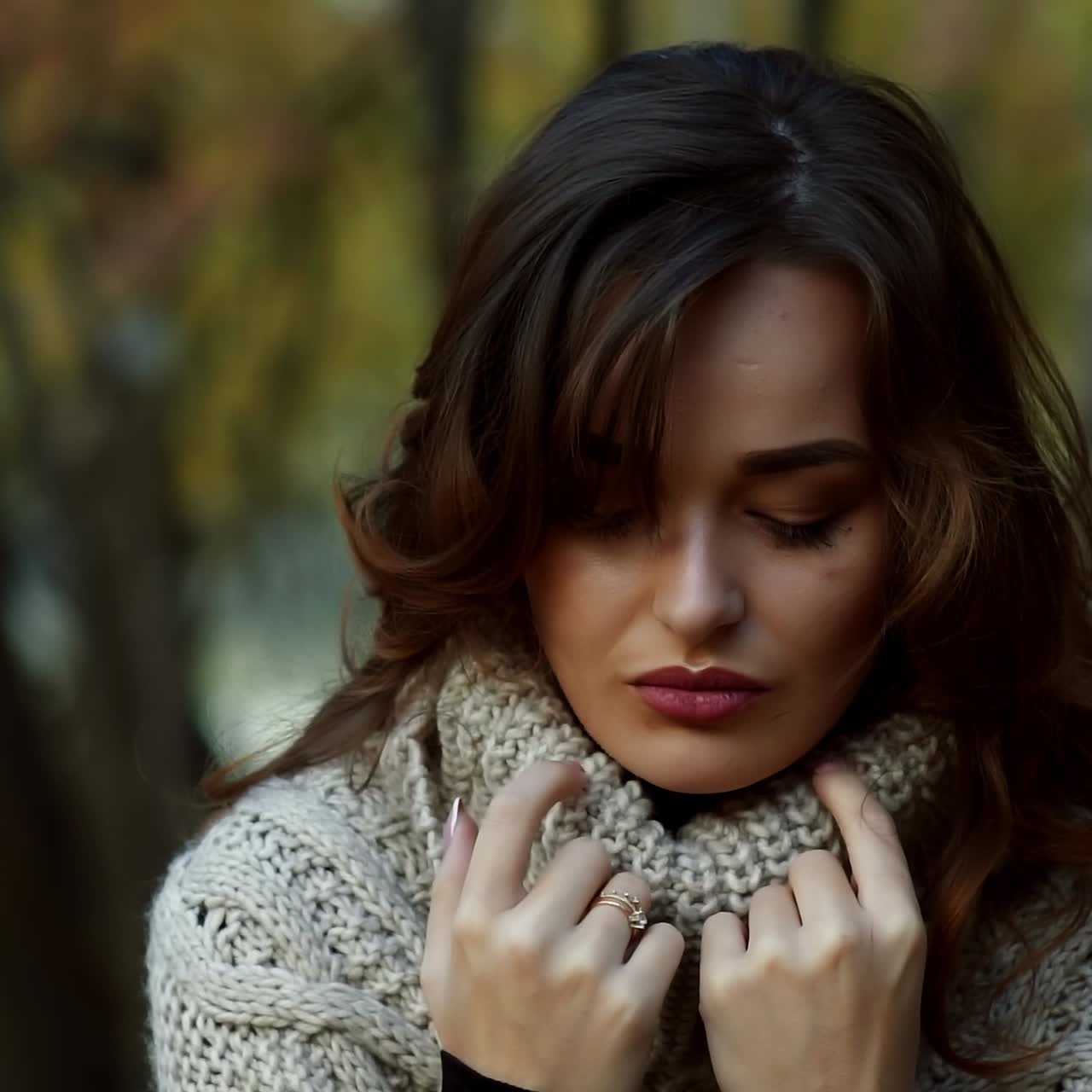 Fashion woman walking in autumn park