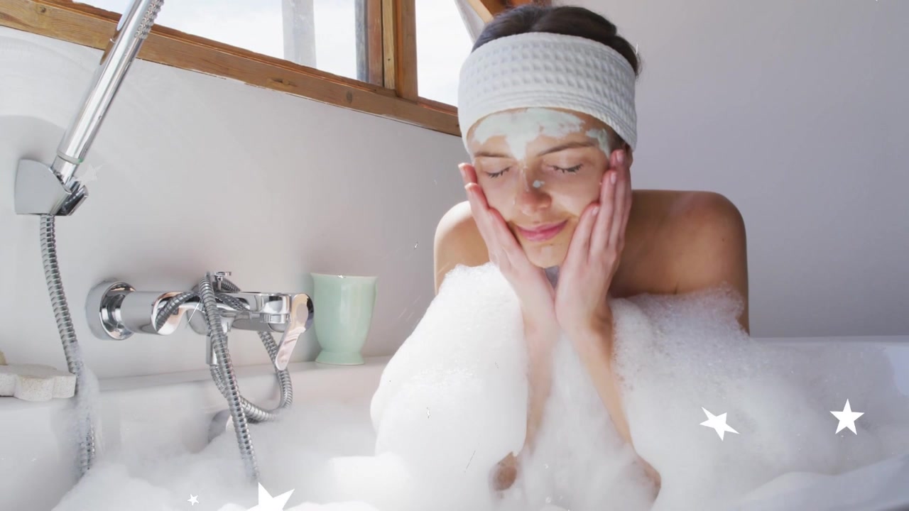 Woman cupping bubbles, pouring foam, rinsing green mask for skincare, stars drifting across frame