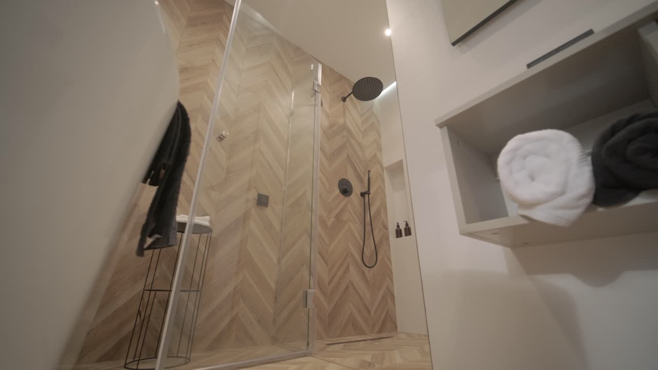 Minimal style modern contemporary white bright bathroom with natural light.
