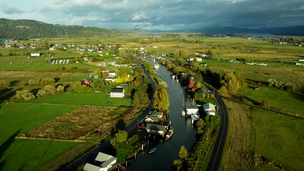 US, WA, Cathlamet, 2025-10-25 - Drone view of Welcome Slough at dawn on a clear fall day