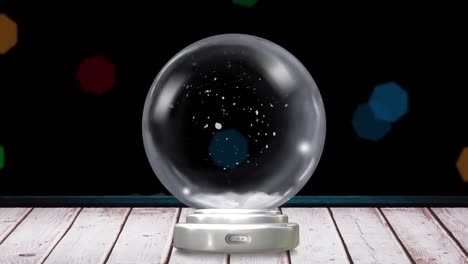 animación del globo de nieve de navidad con copos de nieve sobre fondo negro