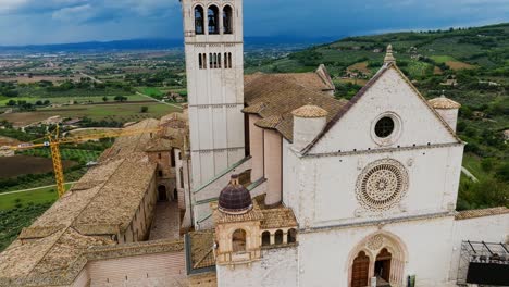 aerial view of the basilica of saint francis of assisi in perugia province, umbria region, italy