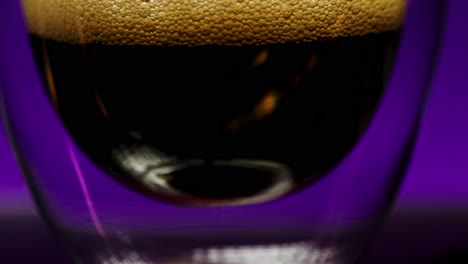 close-up of a dark beer in a glass