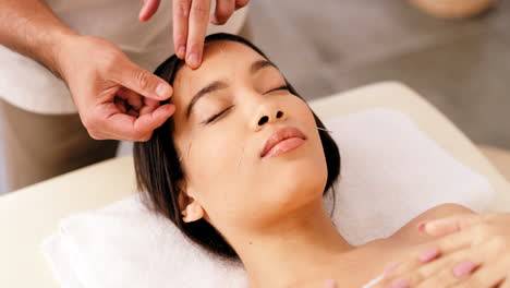 woman, relax and facial acupuncture needles