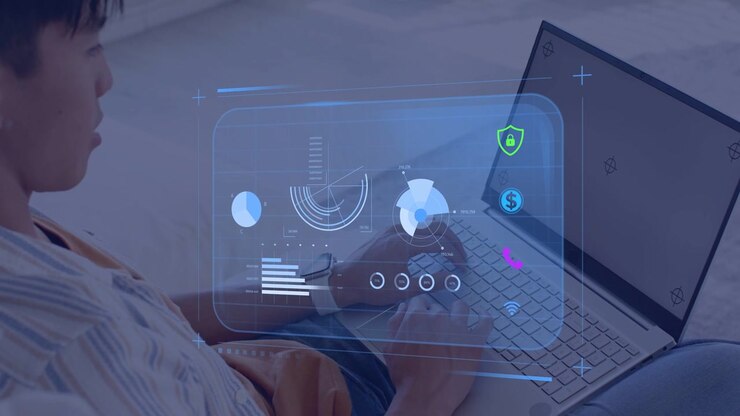 Man placing hands on laptop and typing activating tech HUD with rotating pie charts for business