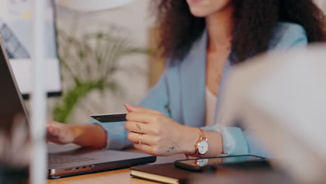 financial worker, laptop and credit card