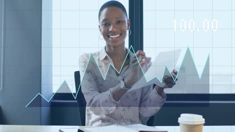 animation of financial data processing over african american businesswoman working in office