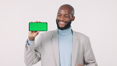 Phone,-black-man-and-green-screen-with-thumbs-up