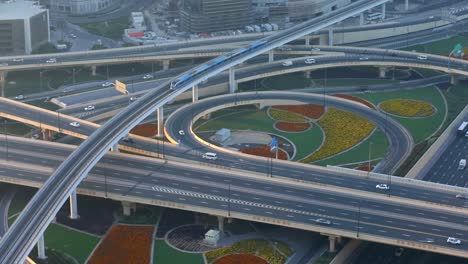 vehicles travelling at the famous sheikh zayed road in dubai, united arab emirates - aerial drone