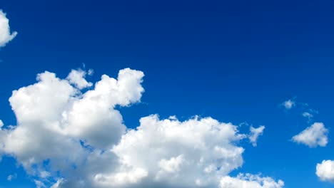 clouds are moving in the blue sky. timelapse