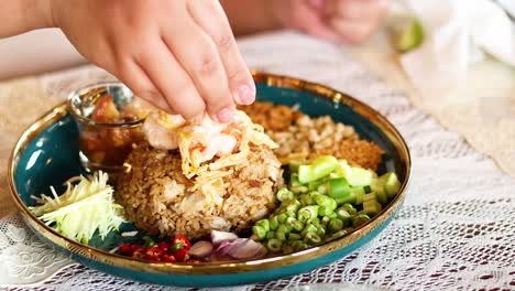 hands preparing and enjoying a traditional meal