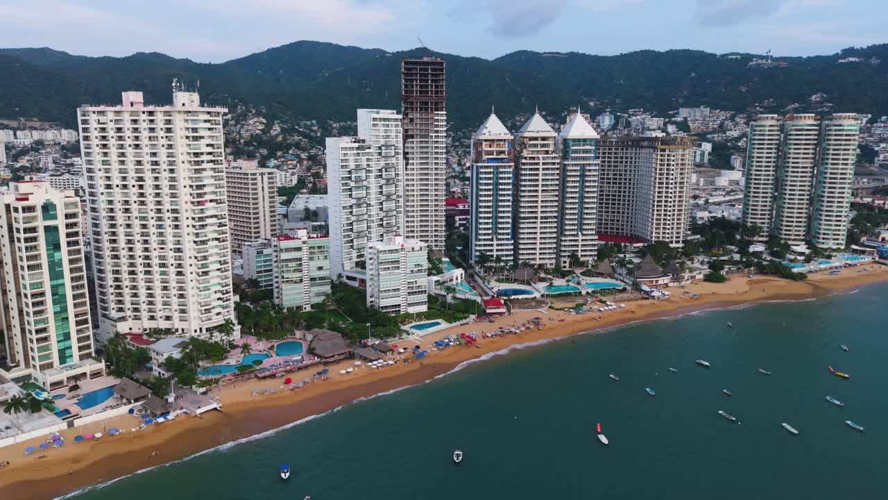 Golden hour drone footage of Acapulco Bay on Guerrero's coast