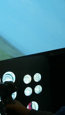 child in a flight simulator
