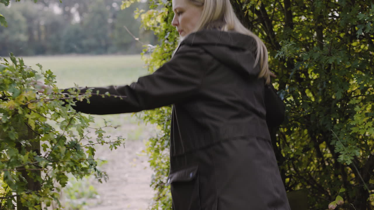 Woman in park on autumn day