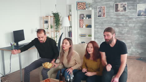 Over-excited-group-of-friends-celebrating-victory