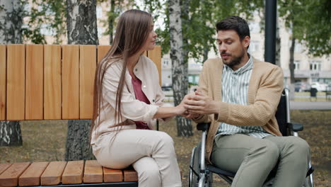 couple in park, showing support
