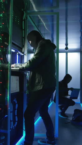 hackers in a server room