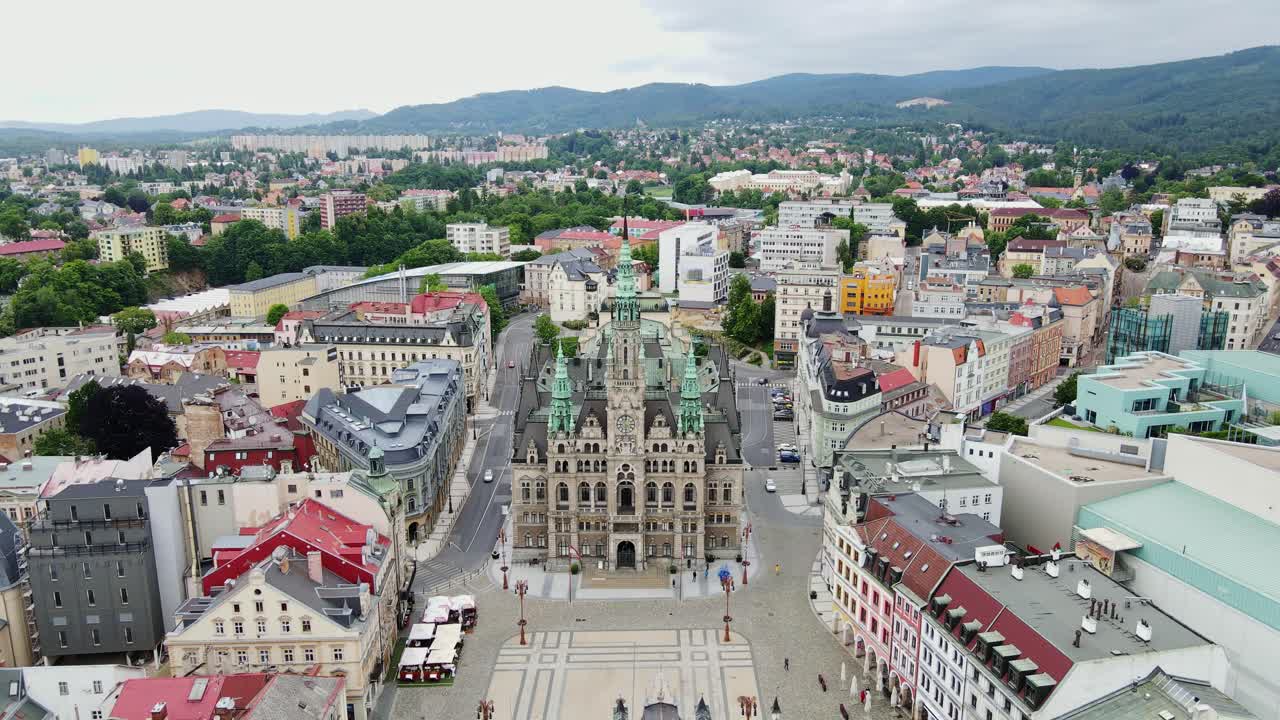 Bird’s-eye perspective of Czech city Liberec with mountains, historical skyline