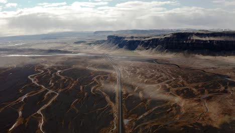 aerial view deserted vulcanic landscape with lonely road at iceland