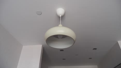 modern beige hanging lamp in a room