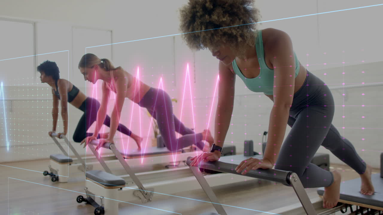 Women exercising on reformer machines with digital wave animation overlay