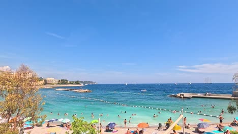 tourists enjoying a sunny beach day