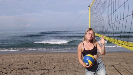 happy beach volleyball player smiling at the camera.