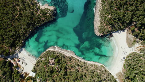 pristine twin beaches of cala mondrago and s'amarador surrounded by lush during summer in mallorca, spain