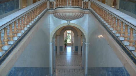 magnificent villa staircase with huge arch