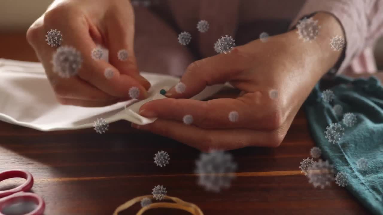 코로나 19 세포의 애니메이션이 마스크를  ⁇ 는 사람 위에