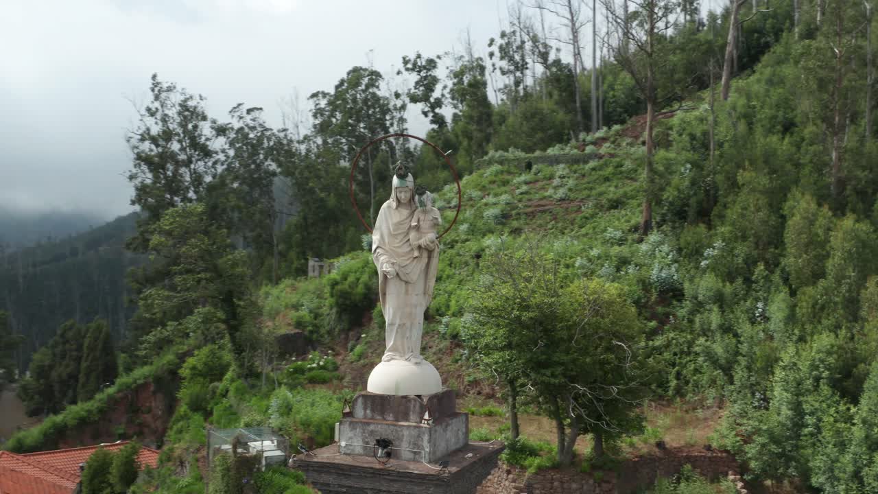 Aerial circling around Sanctuary of Our Lady of Peace, marble statue