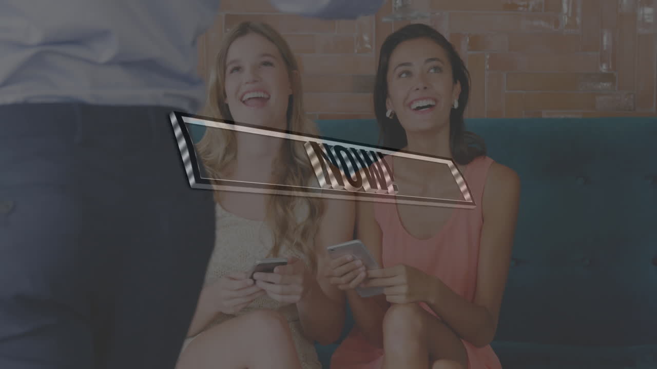 Two women sitting with phones, smiling, as WOW text animation appears