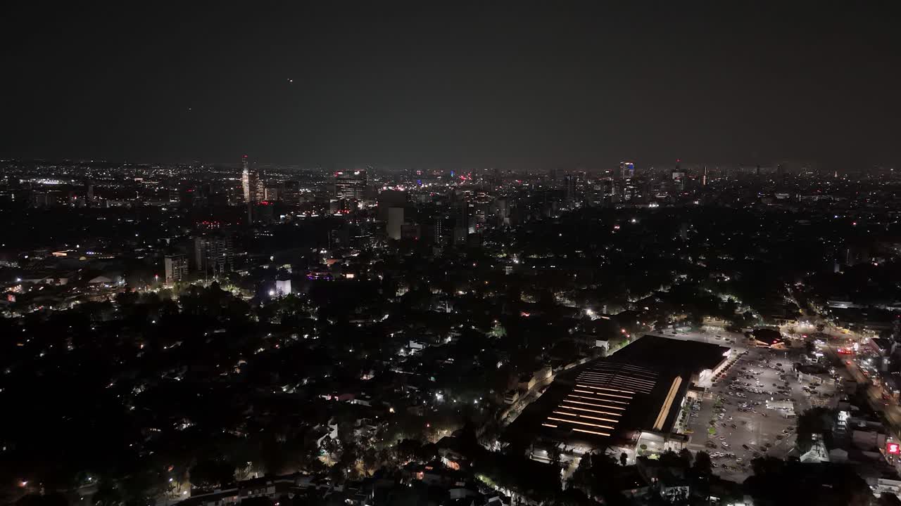 CDMX at night drone captures of illuminated cityscape