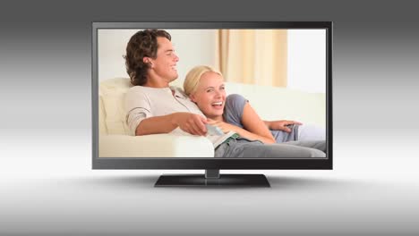 lovely couple watching tv