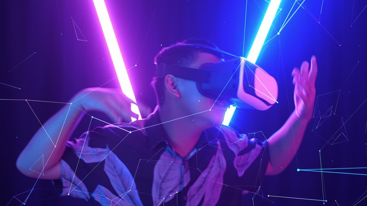 Vr, Futuristic, Entertainment Concept. Excited Asian Boy Using Virtual Reality Headset And Funny Dance With Neon Light At The Background