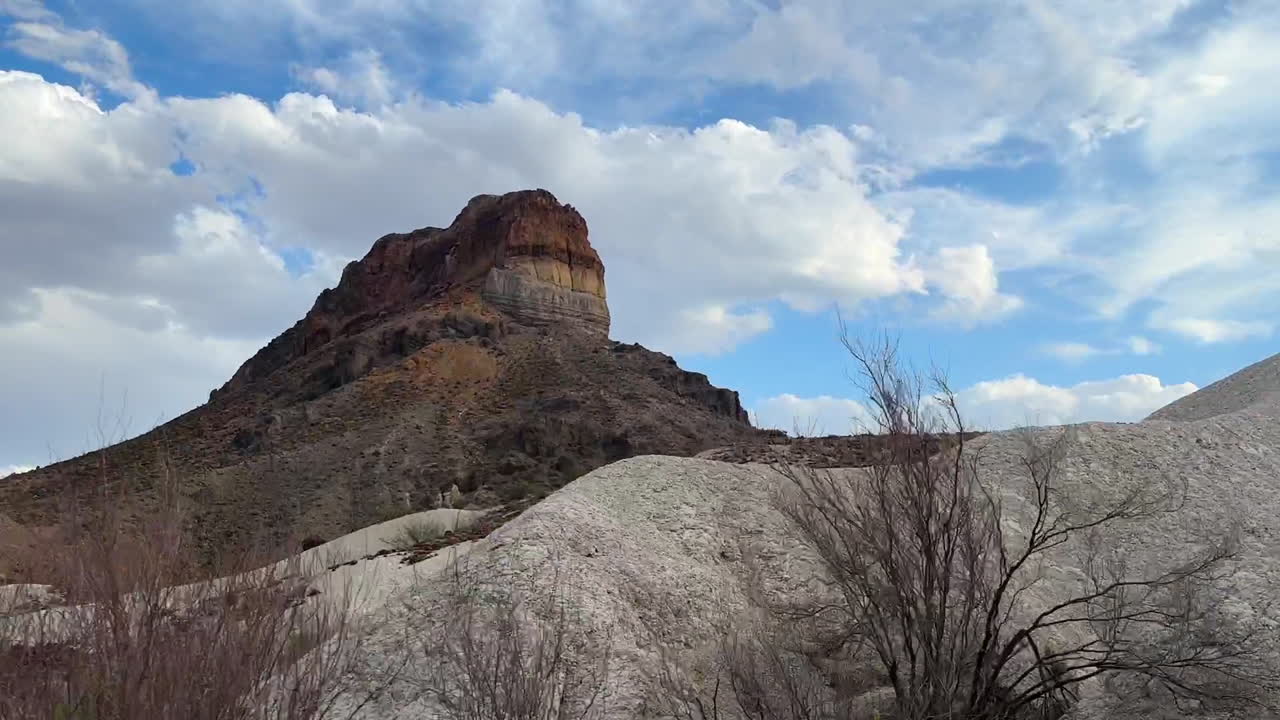 Majestic Rock Formation Under Cloudy Sky