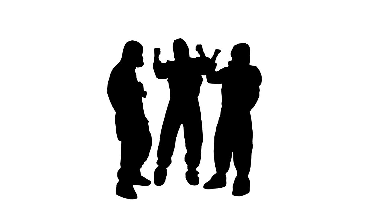 silueta de médicos en trajes de hazamat apilando las manos. trabajo en equipo