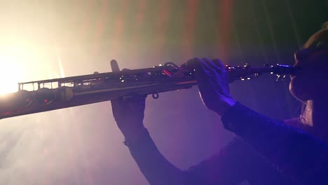 Talented-mature-caucasian-woman-enjoying-playing-trumpet-on-stage-in-concert