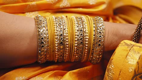 indian woman wearing traditional bangles