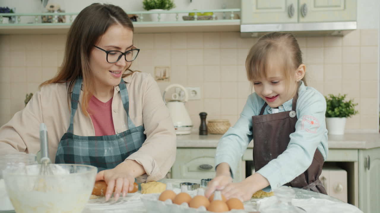 Mother and Daughter Baking Cookies Together