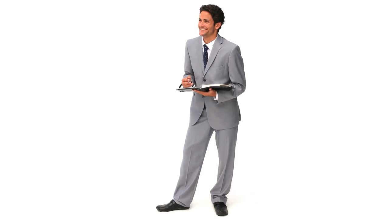 멋진 비즈니스맨이 메모를 하고 있습니다.