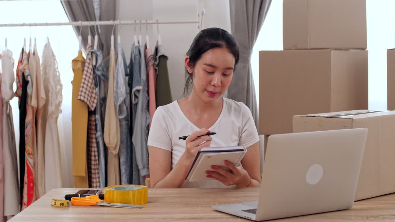 Woman working from home in fashion business